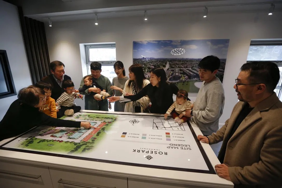 A family will soon be neighbours in a new Thornhill townhouse project